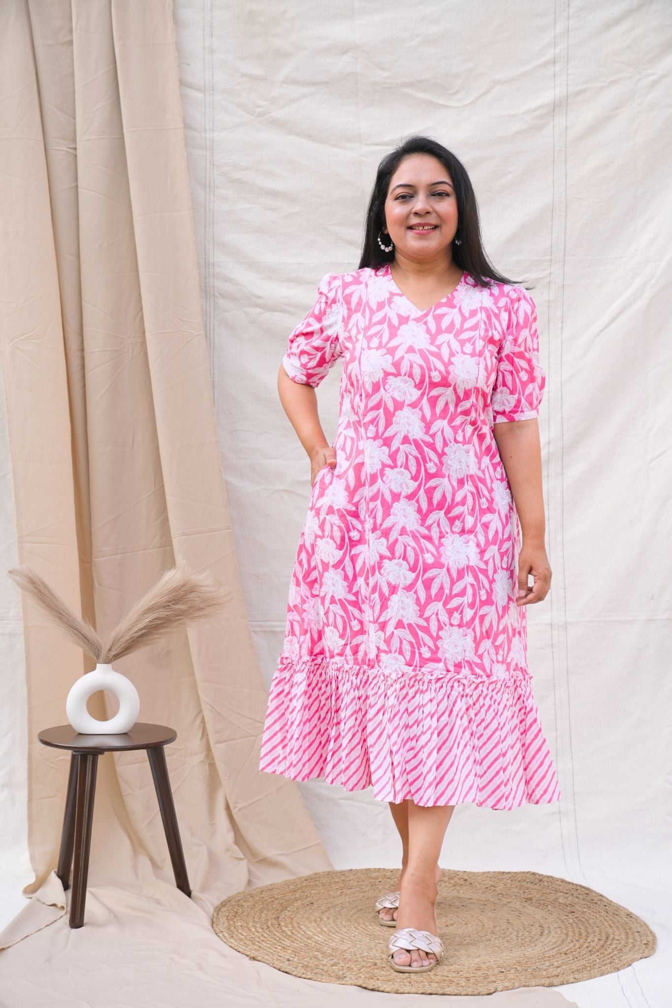 Pink maternity floral A line dress showing pocket