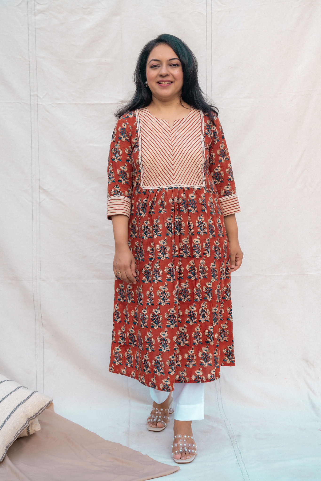 Full look of rust hand block A-line Flare nursing and feeding friendly kurt in pure cotton