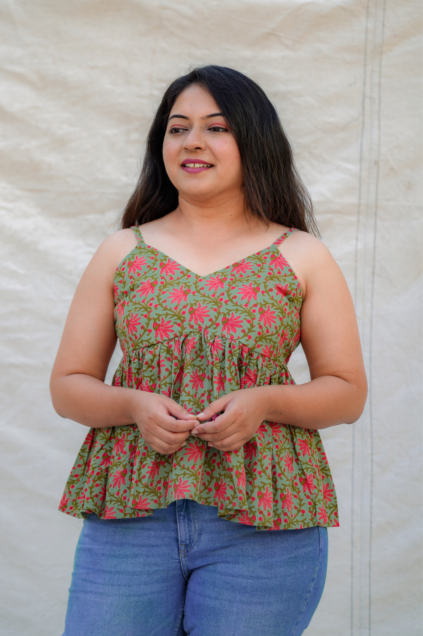 sleeveless spaghetti cotton top with flared waist in green and red colour