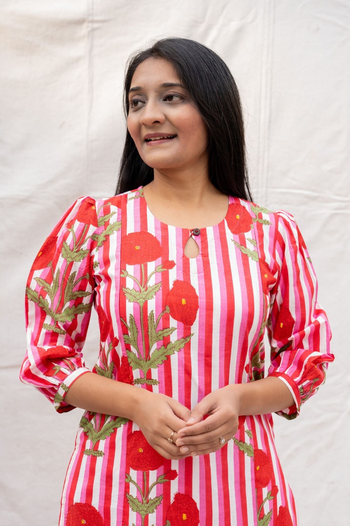 Close up view of pink nursing and feeding friendly kurta showing Round neck with key - hole
