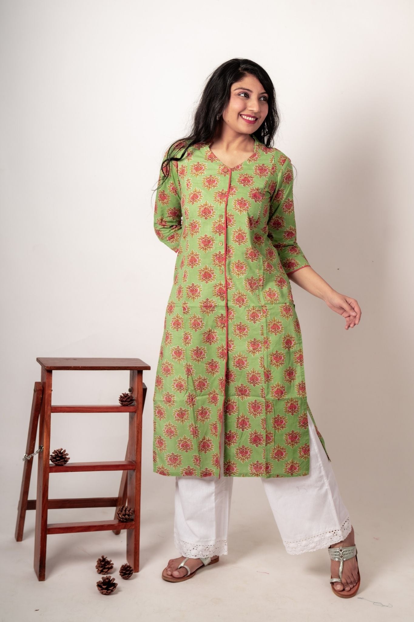 Collared V neck cotton maternity kurta in sage green with floral blocks