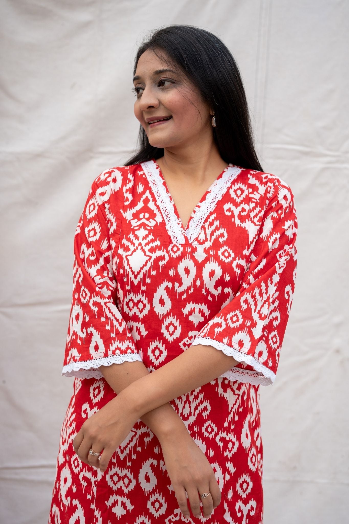 Close up view of red nursing and feeding friendly kurta showing sleeves